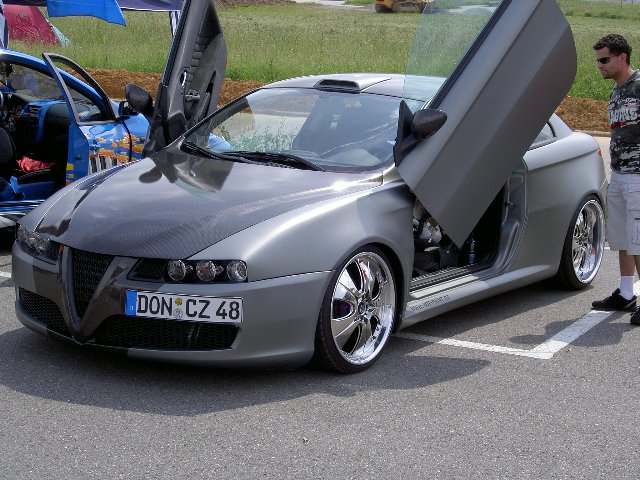 Alfa GT cu faruri de 59 si usi lambo.jpg